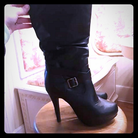 black shin high boots